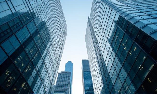Skyscrapers and office buildings representing commercial leases